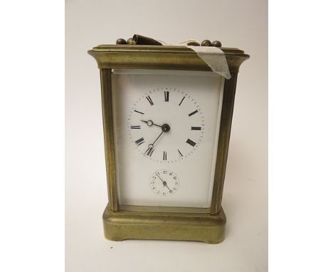 Victor Reclus Brevete Paris, brass cased fire window carriage clock, white enamel Roman dial with subsidiary seconds, 5 1/4 h