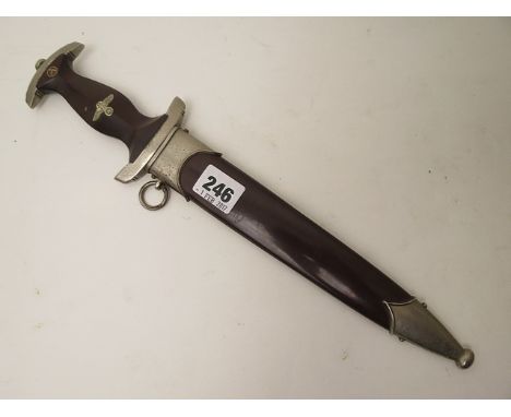 A German Nazi dagger with scabbard, the blade engraved Alles Fur Deutschland and RZM M7/66 1938