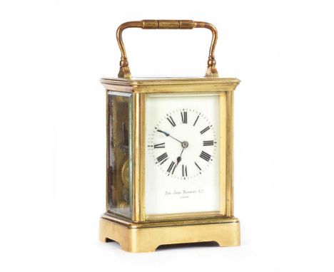 BRASS CASED FOUR PANEL CARRIAGE CLOCK WITH SWING HANDLE SIR JOHN BENNETT LTD., PARIS HEIGHT: 5.5 INCHES WIDTH: 3.5 INCHES DEP