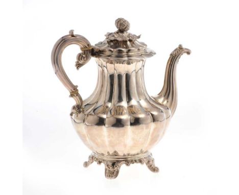 SILVER COFFEE POT WITH EMBOSSED FINIAL LID AND SCROLLED FEET LONDON 1834, MAKER: E.J.B E.W APPROX. 30 TROY OUNCES HEIGHT: 10 