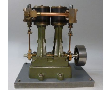 SCRATCH BUILT STEEL AND BRASS MODEL OF A STUART VERTICLE TWIN CYLINDER LAUNCH STEAM ENGINE ON A RECTANGULAR BASE BY R S DARTN