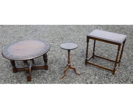 BEECH CIRCULAR COFFEE TABLE WITH INCISED ARCH AND FOLIATE DESIGN TO TOP, ON FOUR ORNATE TURNED BALUSTER LEGS WITH STRETCHERS 