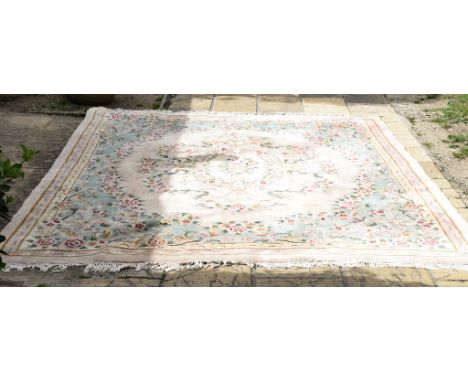 A large Chinese rug, decorated flowers on an ivory ground Condition report Report by NG

Measurements - 368 x 276 cm