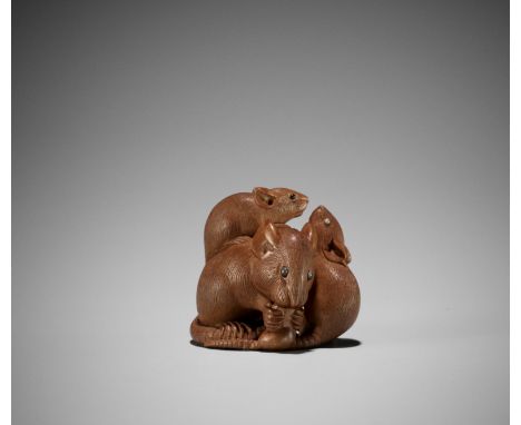 IKKO: A FINE BOXWOOD NETSUKE OF A GROUP OF RATS EATING EDAMAMEBy Ikko, signed Ikko 一光Japan, late 19th centuryComprising one l