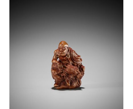 SEIHO: A BOXWOOD NETSUKE OF HANDAKA SONJABy Seiho Azuma (1936-2003), signed Seiho 声方Japan, Ibaraki prefecture, 20th centuryHa