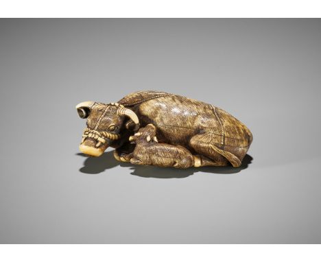 TOMOTADA: AN IVORY NETSUKE OF A RECUMBENT OX AND CALFSchool of Tomotada, signed Tomotada 友忠Japan, Kyoto, 19th century, Edo pe