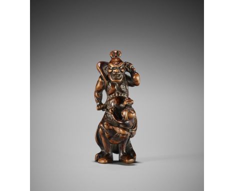 HACHIGYOKU: A RARE WOOD NETSUKE OF A SCULPTOR WITH NIO STATUEBy Hachigyoku, signed Hachigyoku 八玉Japan, Edo (Tokyo), 18th cent