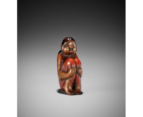 AN UNUSUAL LACQUERED WOOD SHUNGA NETSUKE OF OKAMEUnsignedJapan, 18th centuryCarved as the semi-nude Shinto goddess of mirth O