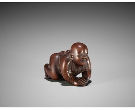 A YAMADA SCHOOL WOOD NETSUKE OF A BABY BOY, ATTRIBUTED TO MASAKATSUAttributed to Masakatsu, unsignedJapan, Ise-Yamada, mid-19