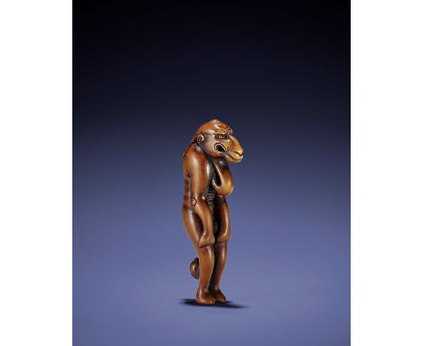 A CONTEMPORARY WOOD NETSUKE OF A MYTHICAL BEASTUnsignedJapan, 20th centuryThe kirin-like creature standing with its arms touc