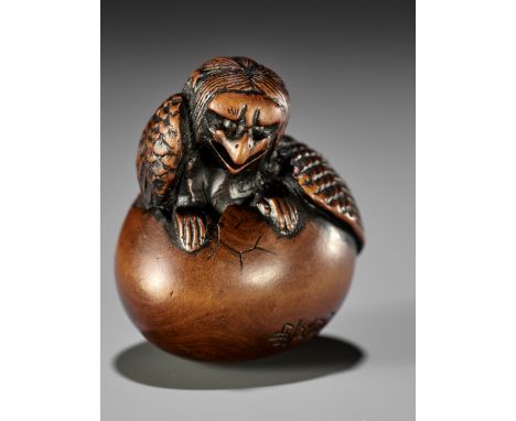 NAITO TOYOMASA: A FINE WOOD NETSUKE OF A HATCHING TENGU (TENGU NO TOMAGO)By Naito Toyomasa (1773-1856), signed Toyomasa 豊昌Jap