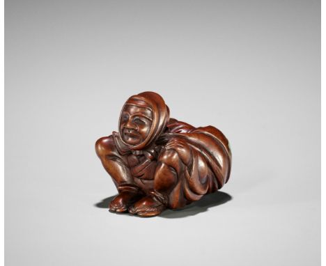 KOSAI: A WOOD NETSUKE OF A MAN CARRYING A SACK WITH ONIBy Kosai, signed Kosai 光齋Japan, Tokyo, late 19th century, Meiji period