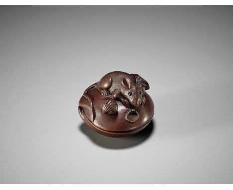 SHOJUSAI: A FINE WOOD NETSUKE OF A RAT ON A CLAMBy Shojusai, signed Shojusai正壽齋Japan, Edo (Tokyo), mid-19th centuryThe rat pe