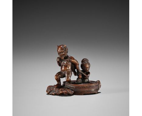 SHOKO: A FINE WOOD NETSUKE OF RAIJIN WITH BATHING WOMANBy Shoko Suganoya, signed Suketada 亮忠 and sealed Shoko 尚古Japan, Takaya