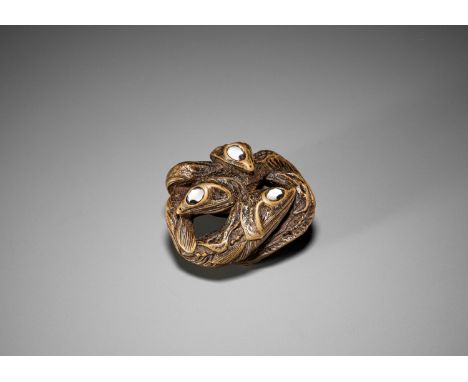 HIDARI ISSAN: A FINE WOOD NETSUKE OF A PILE OF DESSICATED FISHESBy Hidari Issan, signed Hidari Issan 左一山Japan, Iwashiro provi