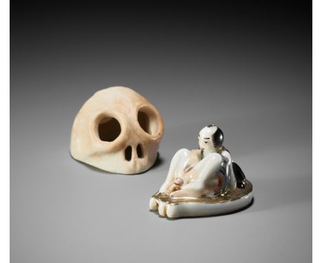 A HIRADO PORCELAIN NETSUKE OF A SKULL WITH HIDDEN SHUNGA INTERIORUnsignedJapan, Meiji period (1868-1912)In the form of a skul