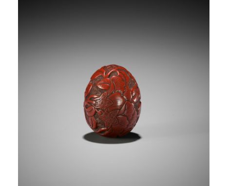 A RARE TSUISHU LACQUER NETSUKE WITH PEONYUnsignedJapan, late 18th to early 19th century, Edo period (1615-1868)The egg-shaped