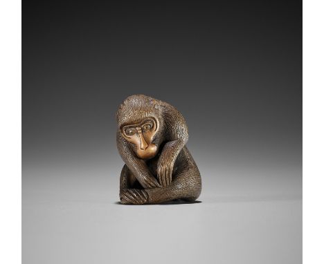 KOICHI: A WOOD NETSUKE OF A MONKEY PICKING FLEASBy Koichi, signed Koichi 光一Japan, second half of 19th centuryFinely carved an