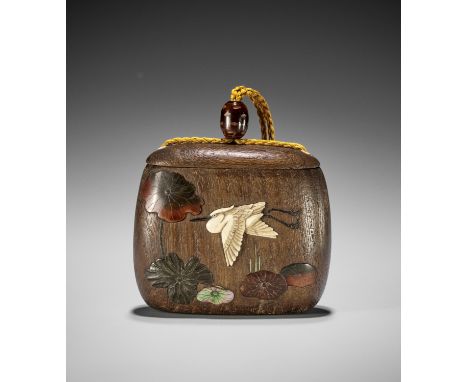 TEIZAN: A SHIBAYAMA INLAID KIRI (PAULOWNIA) WOOD TONKOTSU DEPICTING EGRETS AND LOTUSBy Teizan, signed Teizan 貞山Japan, Tokyo, 
