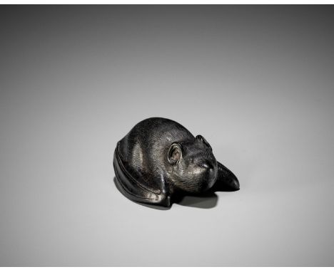 A RARE EBONY WOOD NETSUKE OF A BATUnsignedJapan, late 18th to early 19th century, Edo period (1615-1868)Finely carved as a so