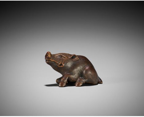SHINZAN MASANAO: A WOOD NETSUKE OF A BOARBy Shinzan Masanao (born 1904), signed Shinzan 辰山Japan, Ise-Yamada, 20th centuryFine
