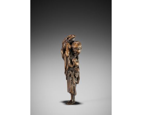 A FINE WOOD NETSUKE OF GAMA SENNIN WITH TWO TOADSAttributed to the school of Hokyudo Itsumin, signed Masatsugu 正次Japan, Edo (