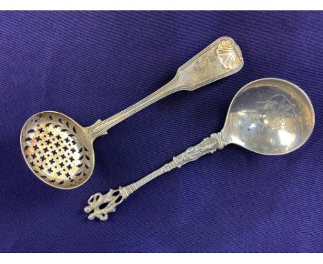 A Dutch silver spoon, import marks for Samuel Boyce Landeck, London 1899, with figural finial, together with a silver sifter 