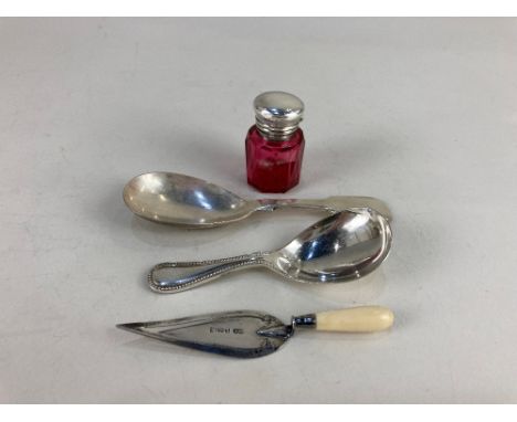 An Edward VII silver mounted cranberry glass scent bottle, maker C C May &amp; Sons, Birmingham 1904, a silver trowel page ma