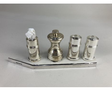 A George V silver pepper mill, makers William Hutton &amp; Sons, Birmingham 1922, three silver plated toothpick holders, one 