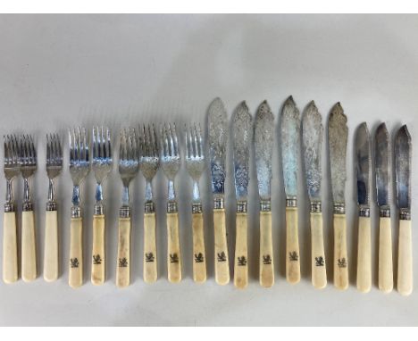 A set of six Victorian silver and ivory handled fish knives and forks, maker William Hutton &amp; Sons, London 1884, with fis