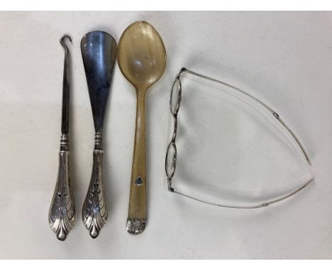 A pair of 19th century Adams silver plate rimmed folding glasses, (glass cracked) a pair of silver mounted tools, button hook