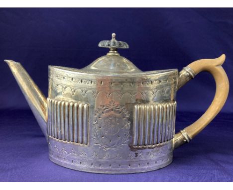 A Victorian silver teapot, maker William Hutton &amp; Sons, Sheffield 1881, of oval form, with engraved and partially reeded 