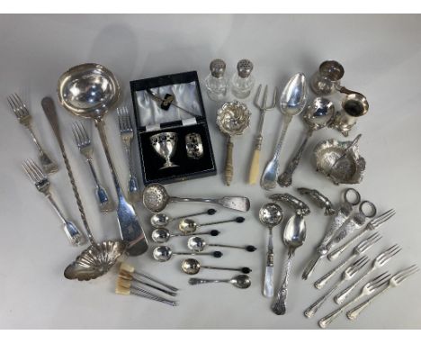 A silver plated soup ladle, together with a collection of silver plated items including grape scissors, forks, sifter spoons,