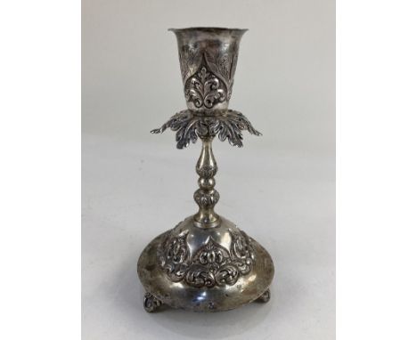 A Portuguese silver candlestick, hallmarked Lisbon, with embossed scrolling design and gilt interior, 19cm high, 6oz