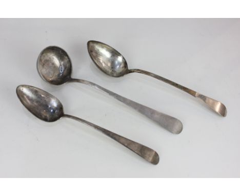 An early 19th century Portuguese silver sauce ladle, Lisbon, circa 1815 and two similar gravy spoons with rounded terminals, 