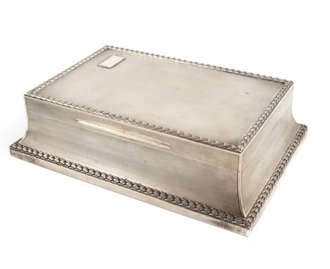 A silver cigar box, by Padgett &amp; Braham Ltd, London 1925, tapering rectangular form, engine-turned decoration, swag borde