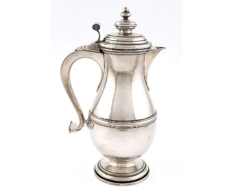 By H.G. Murphy, an Arts and Crafts silver beer jug / flagon, London 1929, also marked with the Falcon mark, in the early 18th
