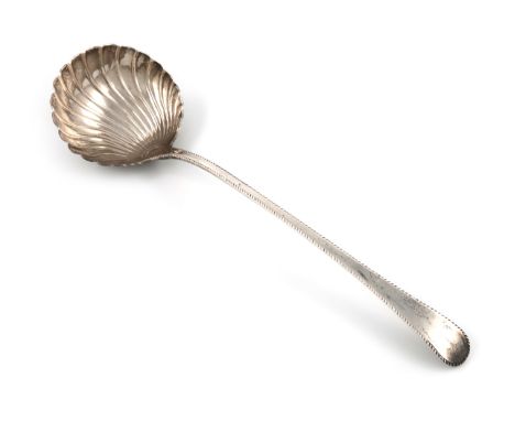 A George III silver Feather-edge pattern soup ladle, maker's mark worn, London 1771, fluted circular bowl, length 33cm, appro