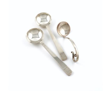 By Charles Boyton, a pair of Art Deco silver soup spoons, London 1937, also signed Charles Boyton, the bowls of circular form
