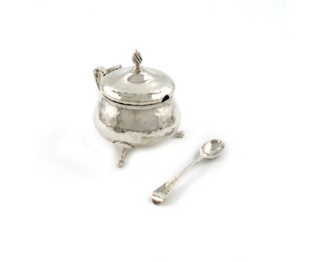 By Charles Edwards, an Edwardian Art Nouveau silver mustard pot and spoon, London 1907, the spoon 1908, tapering circular for
