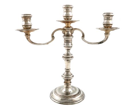 A modern silver three-light candelabrum, by R. Comyns, London 1972, in the George I manner, knopped baluster stem, scroll arm