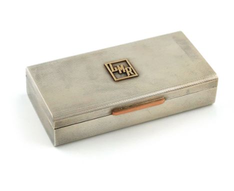 By Alfred Dunhill, a modern silver box, Birmingham 1964, also stamped 'Dunhill London' rounded rectangular form, the engine-t