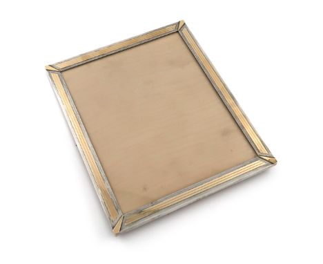 A silver and gold overlay Art Deco photograph frame, by Asprey and Co, London 1938, also scratched 4150/39, upright rectangul