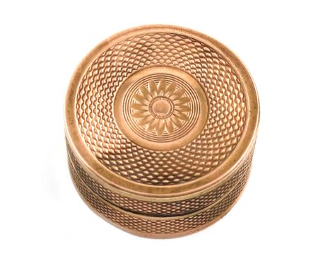 A 19th century gold vinaigrette, unmarked, circa 1830, circular form, engine-turned decoration, the interior with a hinged pi