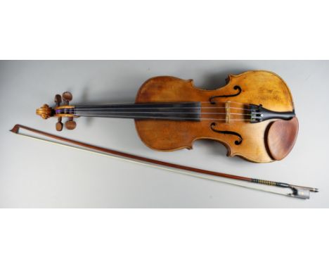 A German Violin after Stradivarius, Late 19th Century, with two piece back and spurious paper label for Stradivarius, the bac