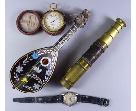 A Late 19th Century Brass Cased Three Drawer Telescope with leather bound centre section, 5.75ins overall, a late 19th Centur