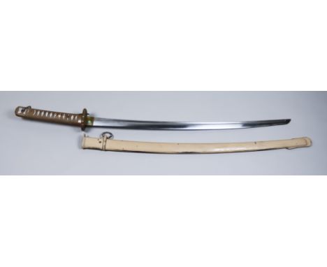 A World War II Japanese N.C.O. machine made Showato blade, Serial No. 136369,  on blade and scabbard, brass pierced Tsuba for