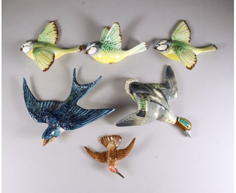 Six Beswick Pottery Bird Wall Plaques - swallow, model no. 757-1, 7ins high, teal duck, model no. 1530-3, 5.75ins, two blue t