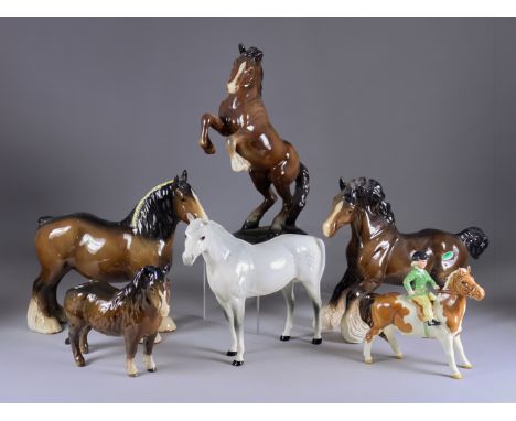 A Beswick Pottery Model of a Rearing Welsh Cob, model no. 1014, 10.75ins, a running horse - "Spirit of the Wind", on wood bas