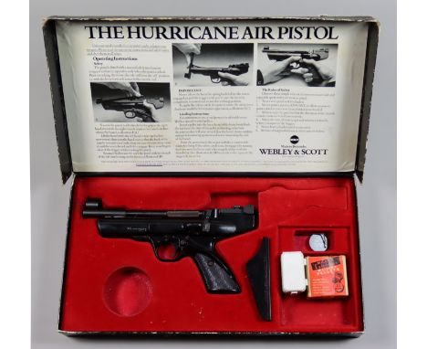A .22 Air Pistol by Webley, Model Hurricane, 8in blued steel barrel, elevating sights, composite frame and grips, in original